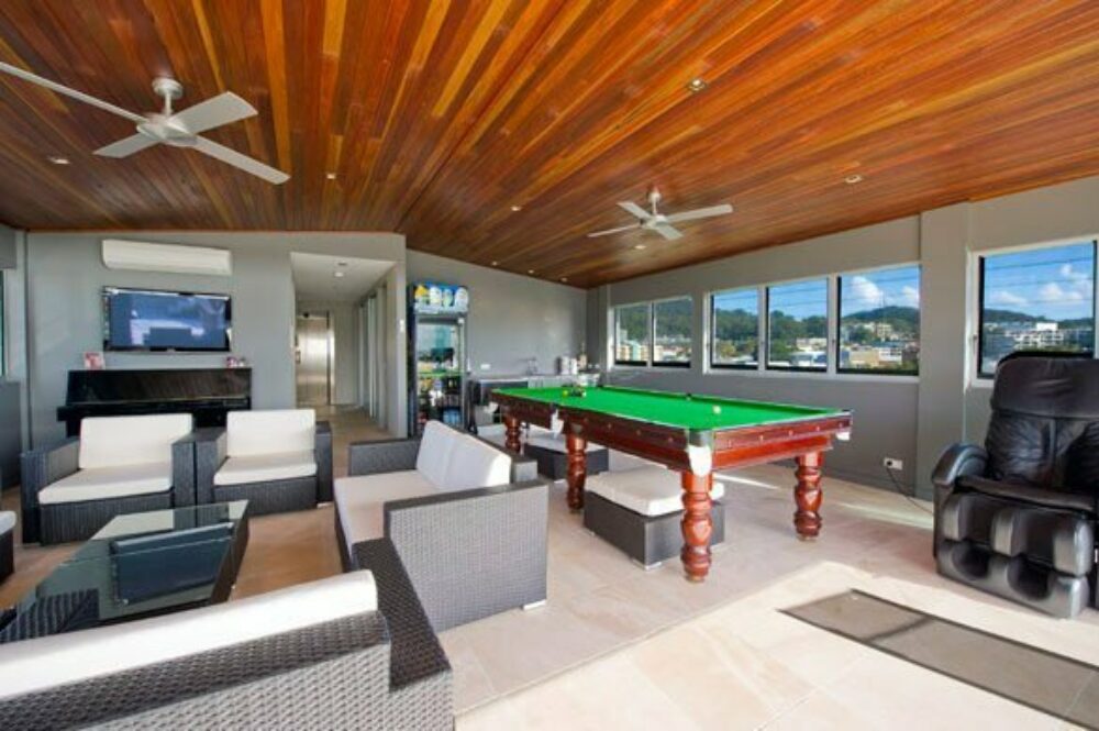 Sorensen design and planning multi magnus living room with pool table